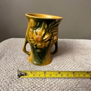 Roseville pottery peony double handled vase, marked 57-11. Small chip.